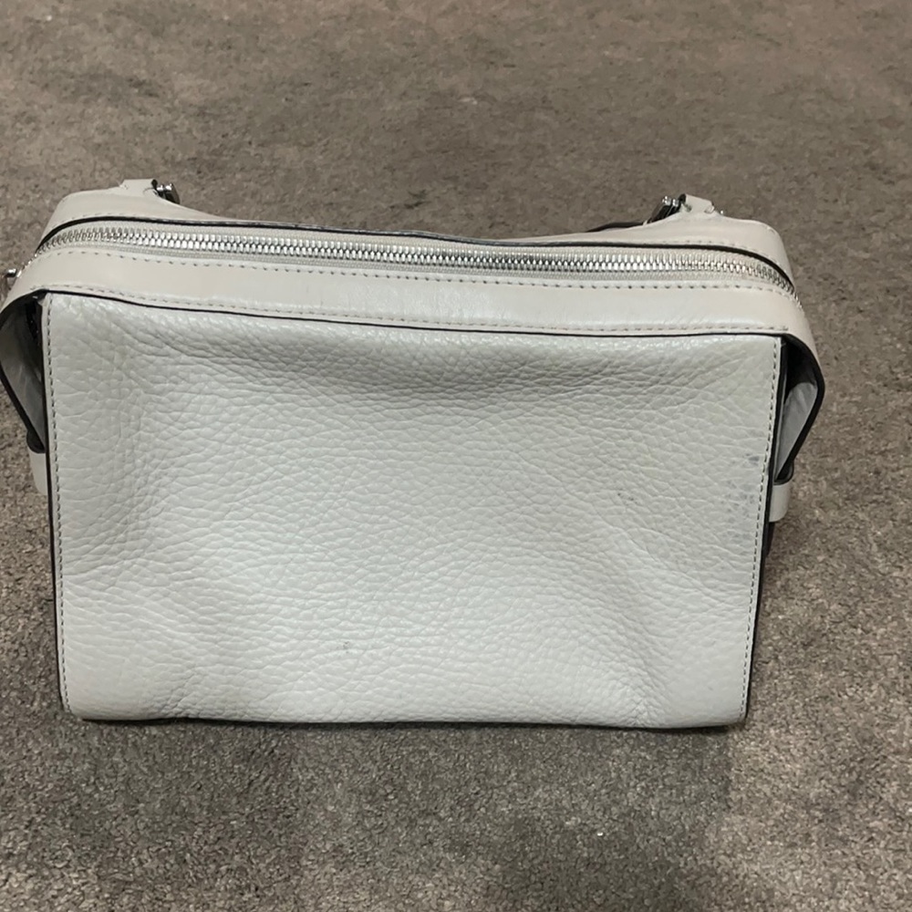 Beige. MK. Small purse. Hand bag/ crossbody. Used.